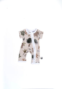 Nature inspired colours: earthy and beige short sleeve onesie with soft patterned flowers and fauna. Soft and neutral in tone.