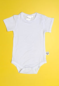 A beautiful high quality bright white short sleeve onesie against a bright colored backdrop. A small white label sits out from the torso side with a cartoon black and white panda covering his eyes playfully.