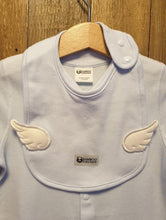 Load image into Gallery viewer, Baby blue bib, with pearly white wings, sat on top of a baby blue angel onesies, on a wooden coat hanger.  