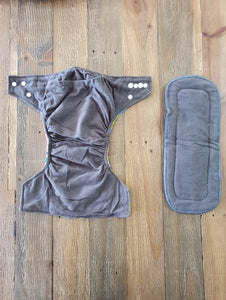 Image of charcoal grey inside of nappy and liner.