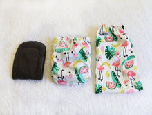 Load image into Gallery viewer, Pink Flamingos with vibrant watermelons and bananas, a a real summer style nappy. 