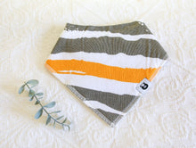 Load image into Gallery viewer, Yellow, grey and white tiger stripe patterned bib. 