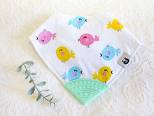 Load image into Gallery viewer, Neon pink, turquoise and pink round birdies on a white bib, with a mint green teething tip.