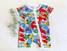 Load image into Gallery viewer, Vibrant and colourful short sleeve onesie with a host of fish and sea creatures, in a splash of attention grabbing colours including res, blue, yellow, green and purple.