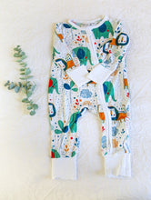 Load image into Gallery viewer, Cute and colourful safari animals, including a green elephant and orange lion, on a white long sleeve onesie.