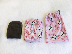 A beautiful blush pink nappy with panda bears and hot pink bamboo. 